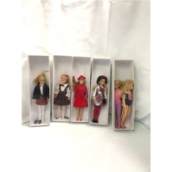 Group of 6 vintage skipper Barbie dolls - includes teen Barbie in dress coat / Barbie in swimsuit et