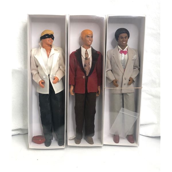 Group of 3 vintage Ken dolls - includes 1985 dream glow black Ken / Ken in masked costume ball outfi