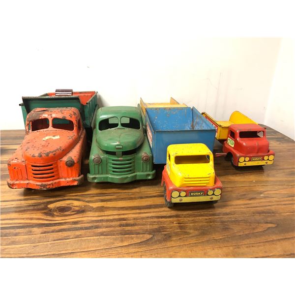 Group of 5 vintage toy trucks - includes Husky trucks / construction trucks etc