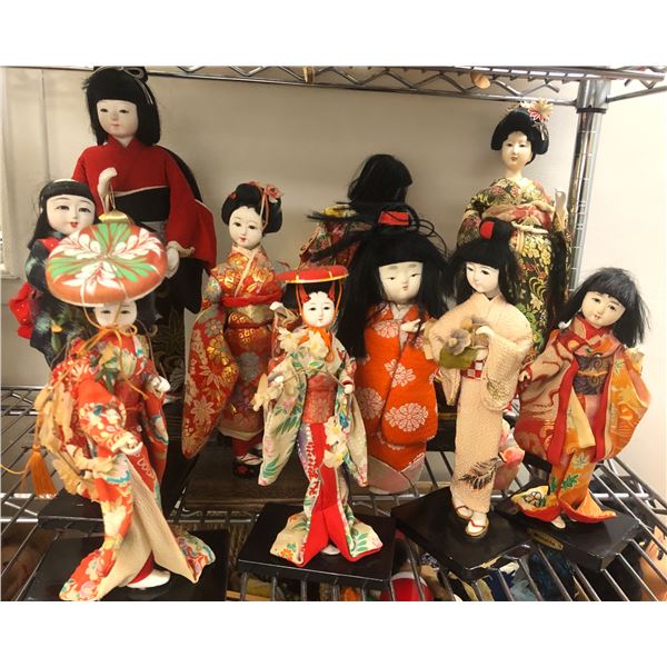 Group of 12 Japanese oriental dolls in kimono outfit