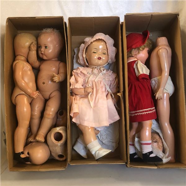 3 boxes of assorted vintage baby dolls