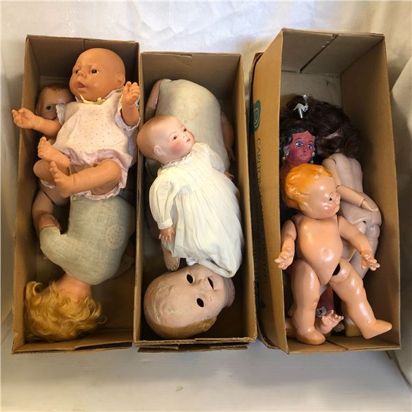 3 boxes of assorted vintage baby dolls