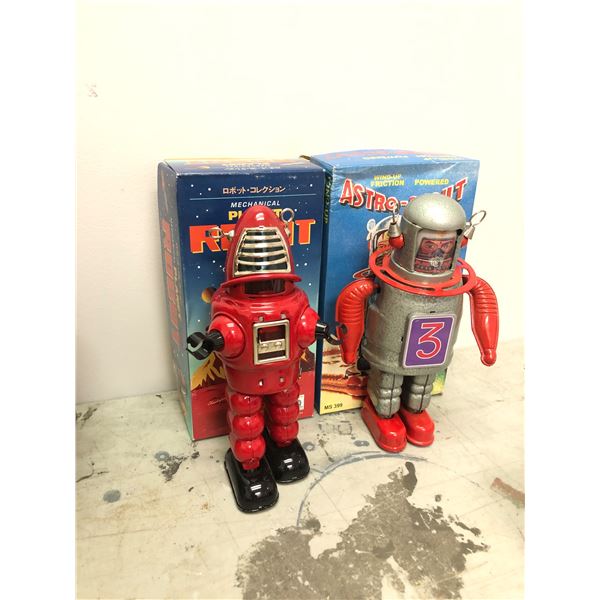 Group of 2 vintage estate toys - includes mechanical planet robot (in box) & Astro scout wind-up rob