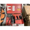 Image 1 : HILTI DX450 POWDER ACTUATED FASTENER NAILER GUN WITH ATTACHMENTS IN HARD TRANSPORT CASE