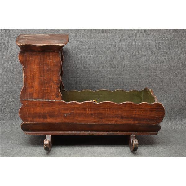 WOODEN CRADLE WITH PLAINS INDIAN DOLL