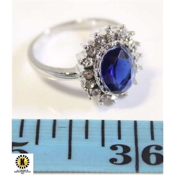 9 X 10 OVAL BLUE CZ WITH CLEAR ACCENTS SIZE 9