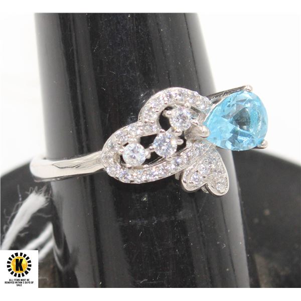 #140-SWISS BLUE TOPAZ & CZ RING SIZE 6.25