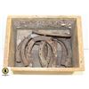 Image 1 : SMALL WOODEN CRATE WITH 8 HORSESHOES