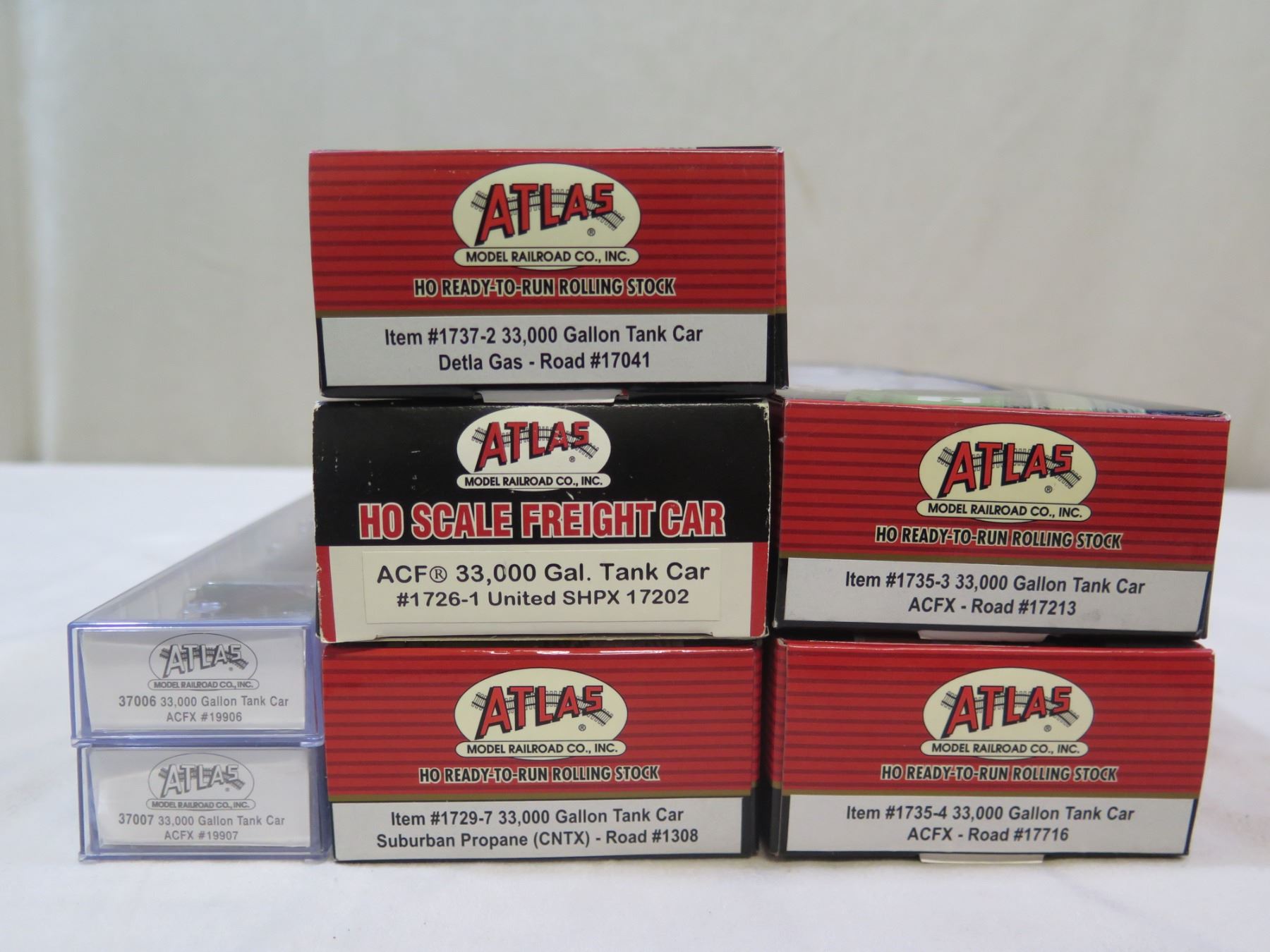 Qty 7 Atlas Railroad Tank Cars, Misc Sizes in Boxes - Oahu Auctions