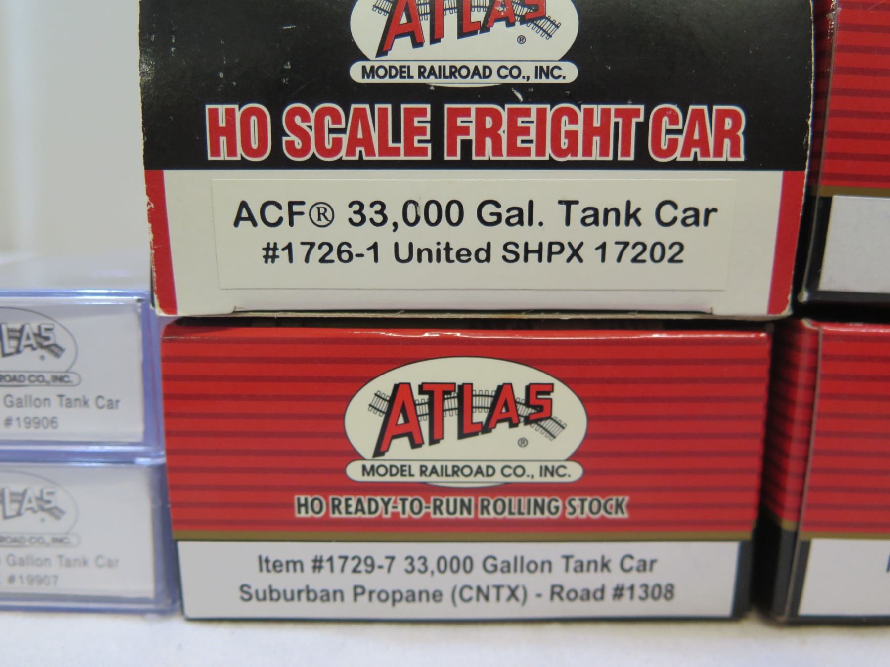 Qty 7 Atlas Railroad Tank Cars, Misc Sizes in Boxes - Oahu Auctions