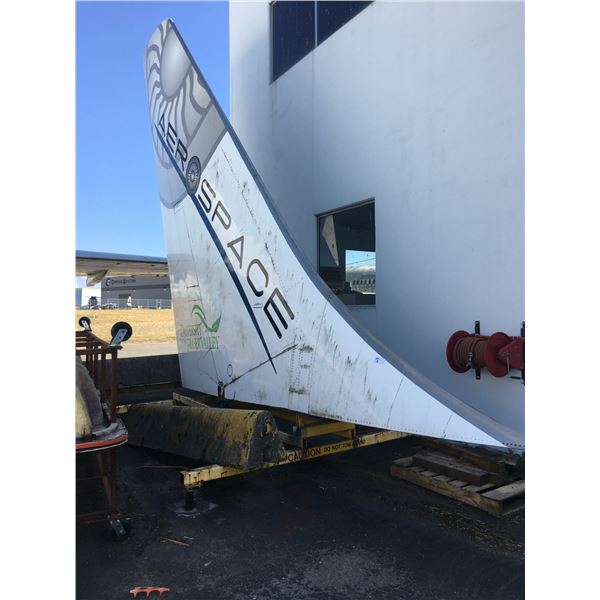 BOEING MODEL 737 TAIL PIECE WITH METAL TRANSPORT DOLLY-*NO REMEDIATION HAS BEEN DONE*
