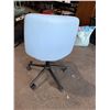 Image 2 : Light blue office chair on castors
