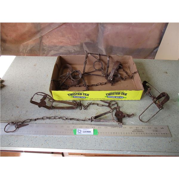 (2) Conibar Traps, (3) Legs Hold Traps (Leg holds are for parts)