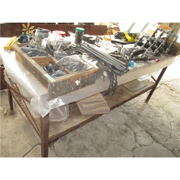 Shelf with Mostly Irrigation Supplies, Safety Harness