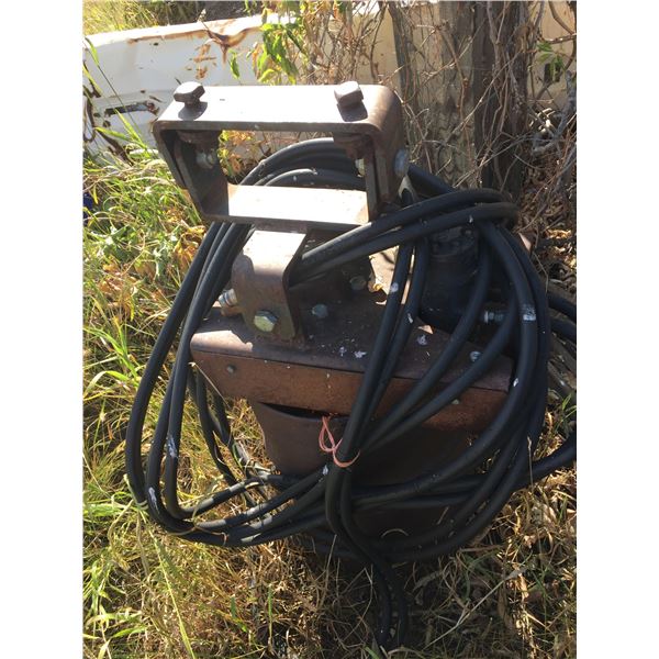 Hydraulically Driven Post Hole Digger Mounted on a Front End Loader