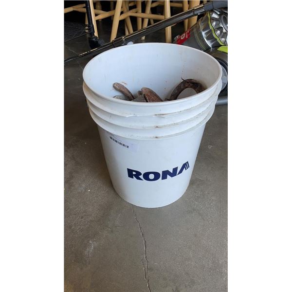 BUCKET OF HORSE SHOES