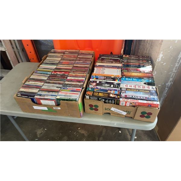 2 BOXES OF DVDS AND CDS APPROX 200 TOTAL