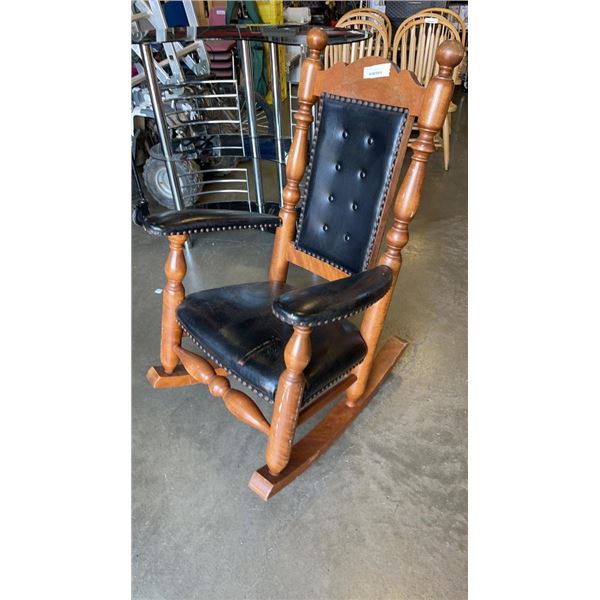 LEATHER ROCKING ARMCHAIR WITH JEAN LOUIS HOULE INSCRIBED