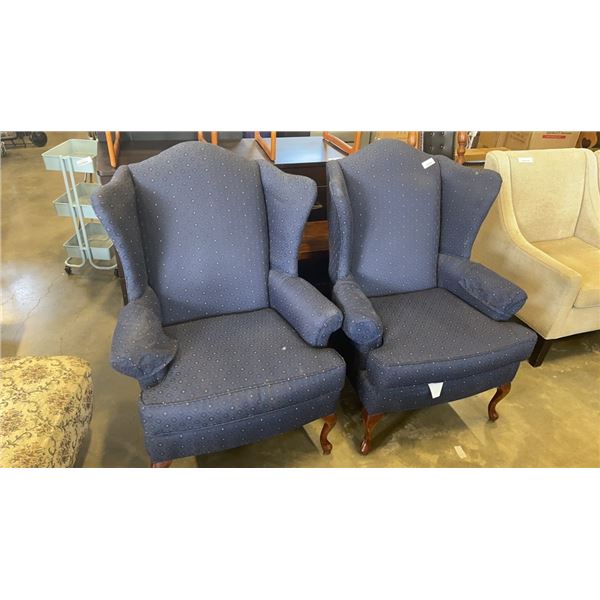 PAIR OF UPHOLSTERED WING BACK ARMCHAIRS