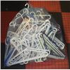 Image 1 : OVER 70 PLASTIC HANGERS