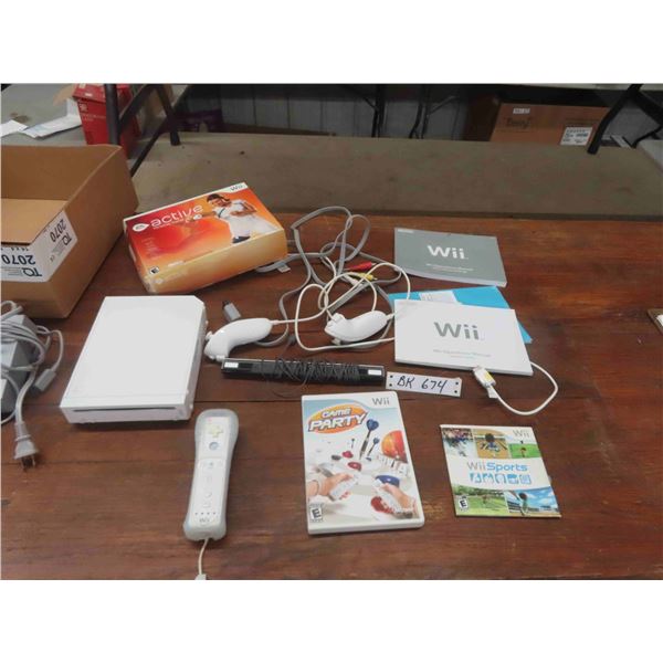 Nintendo Wii Game Console with Controls and Games