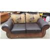 Image 1 : Rustic Leather Couch with Cowboy Design