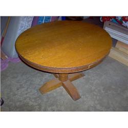 36" round oak table, single leg w/cross foot