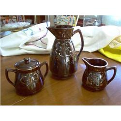 Pitcher, creamer, and sugar set Earthenware