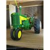 Image 2 : JOHN DEERE DIECAST TRACTOR W/CLOCK IN TIRE