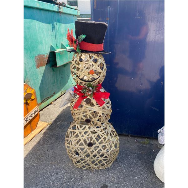 Snowman arms are in bag