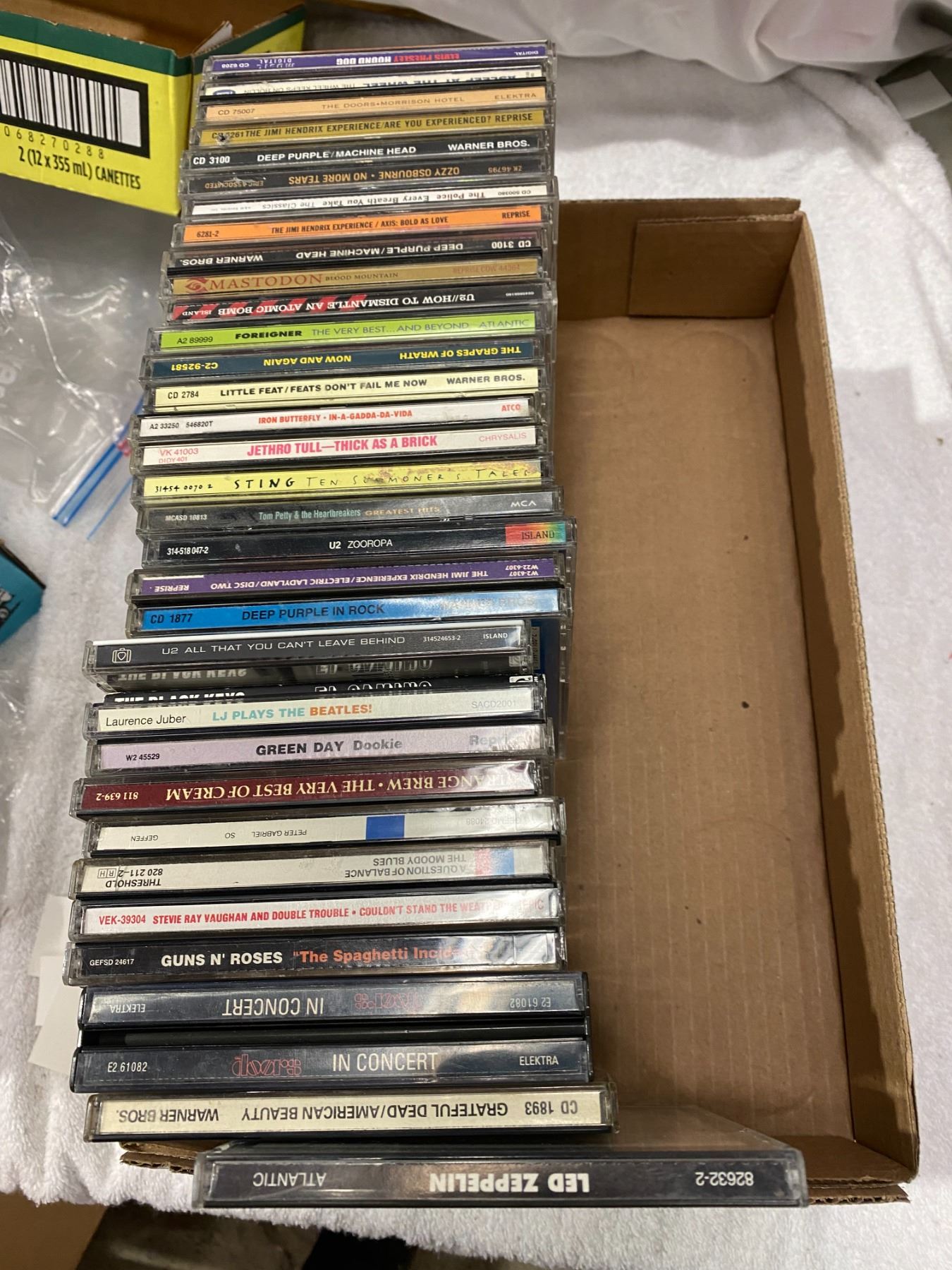 Cds led zeppelin and Sting etc