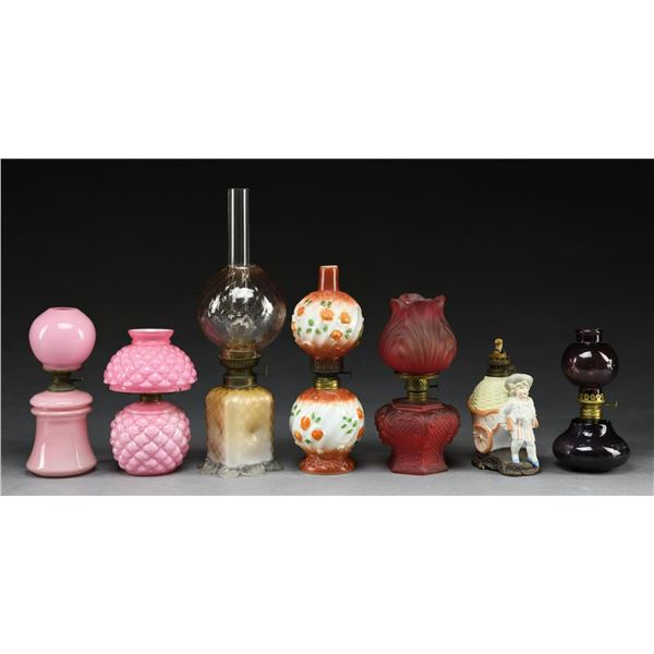 GROUP OF SEVEN ANTIQUE MINIATURE LAMPS.