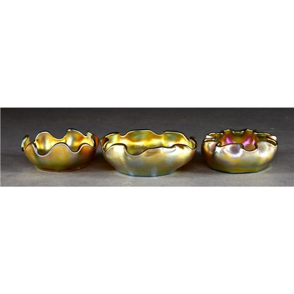 THREE TIFFANY FAVRILE SALTS.