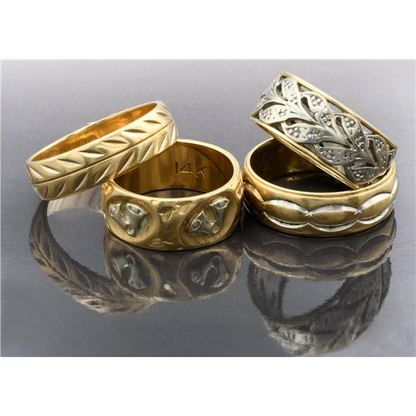 FOUR 14KT YELLOW AND WHITE GOLD RINGS.