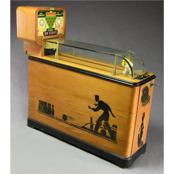 5 CENT EVANS TEN STRIKE ARCADE GAME.