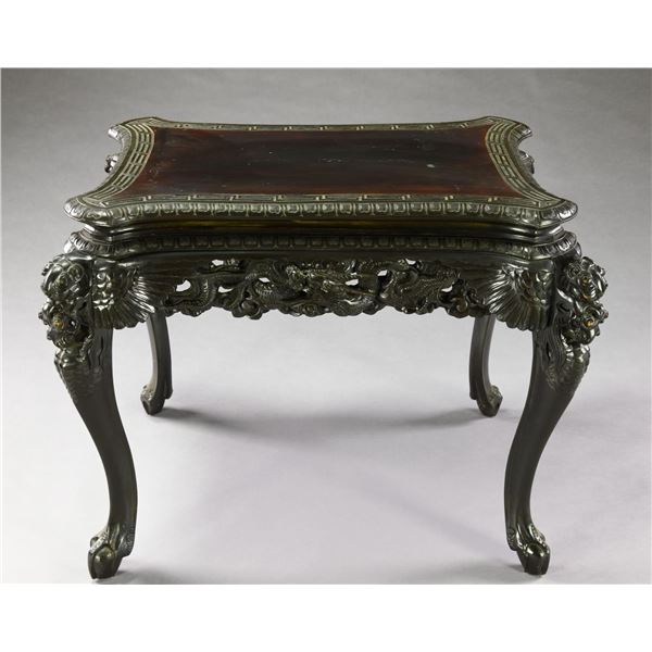 CHINESE EBONIZED CARVED CENTER TABLE.