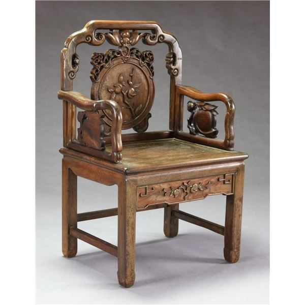 CHINESE CARVED ROSEWOOD ARMCHAIR.