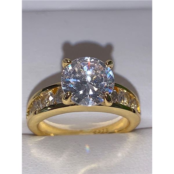 Ladies 1.0 Carat Brilliant Cut Solitaire engagement ring with bezel set stones in band size 7