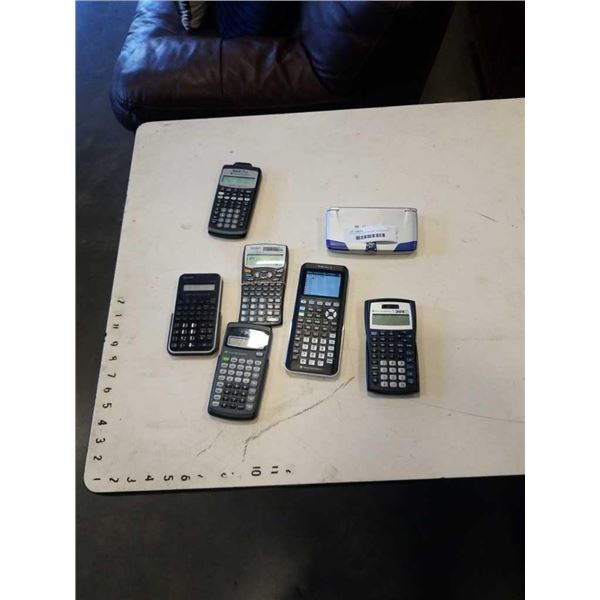 LOT OF CALCULATORS AND TRANSLATOR - TEXAS INSTRUMENT, ETC