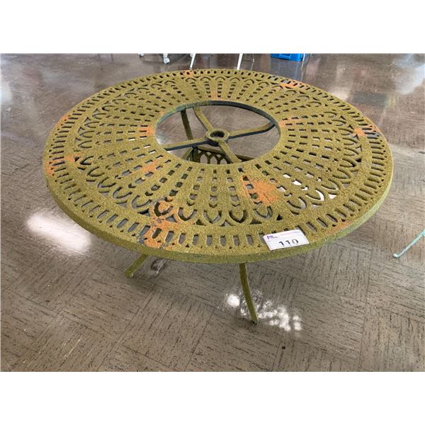 ROUND METAL PATIO TABLE COVERED WITH MOSS APPROX 28"X48"