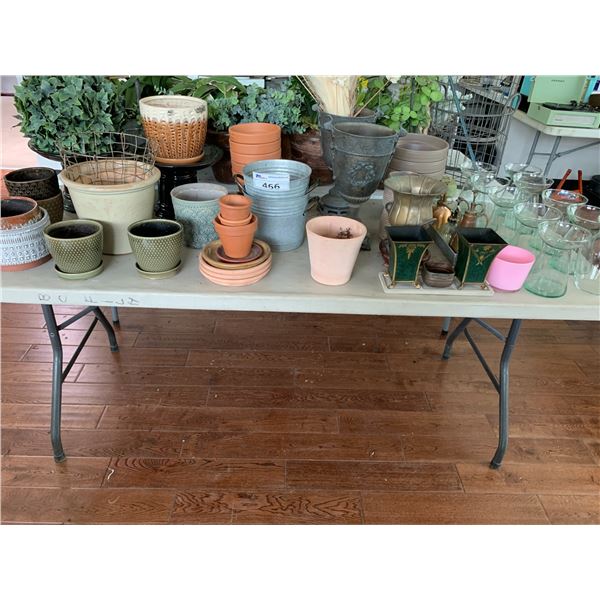 ASSORTED ITEMS INCLUDING; PLANTER POTS, VASES, VINTAGE SOAP DISPENSERS & MORE (TABLE NOT INCLUDED)