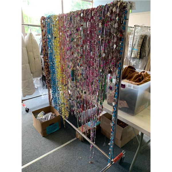 RACK & BOX OF ASSORTED HANGING BEADS