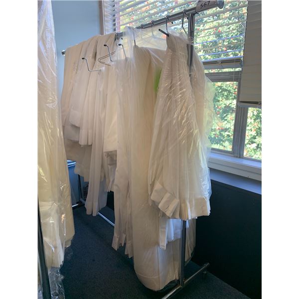 RACK OF ASSORTED SHEET SETS & CURTAINS