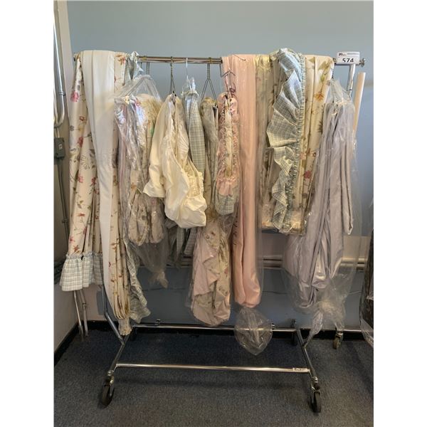 RACK OF ASSORTED CURTAINS, FITTED SHEET & TABLE SKIRTS