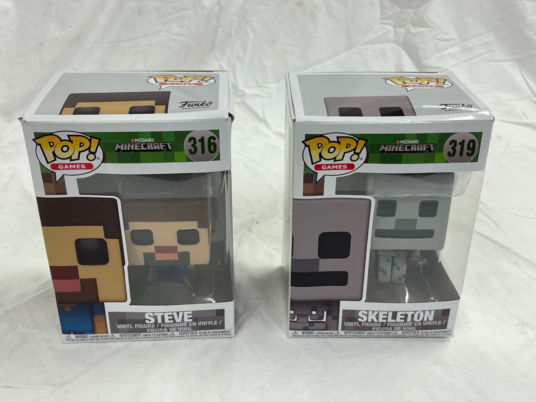 Funko Pop! Games Mojang Minecraft Steve & Skeleton figurines in boxes