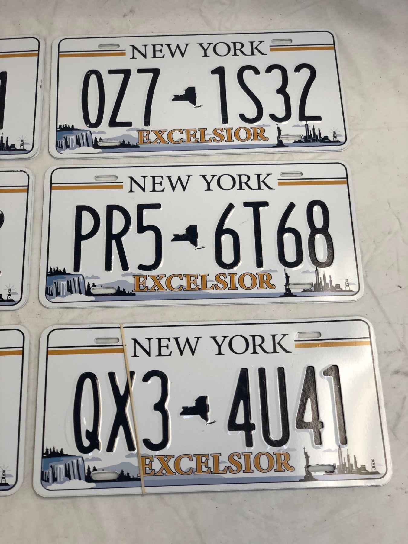 Excelsior Numbers Group of assorted New York Excelsior prop number plates