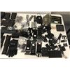 Image 2 : Table top full of assorted Police tactical gear & accessories - includes large group of belts/ baton