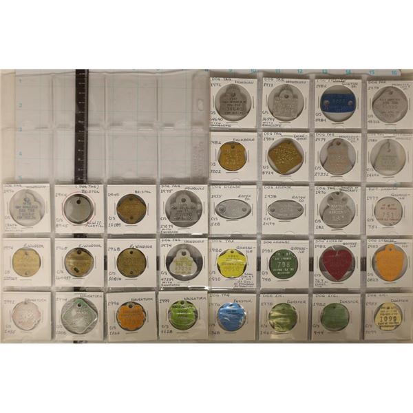 32 VINTAGE METAL DOG TAX AND LICENSE TAGS FROM
