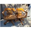 Image 1 : 2 vintage solid oak, swivel/ rolling desk chairs.