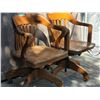 Image 6 : 2 vintage solid oak, swivel/ rolling desk chairs.